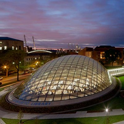 Exterior of Mansueto Library from above at night time