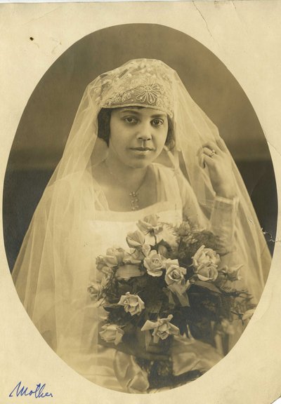 Eva in wedding gown, 1918