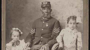 Unidentified African American Union Veteran with 2 children ca 1900 from The History of Juneteenth