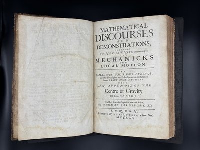 A book open to its title page